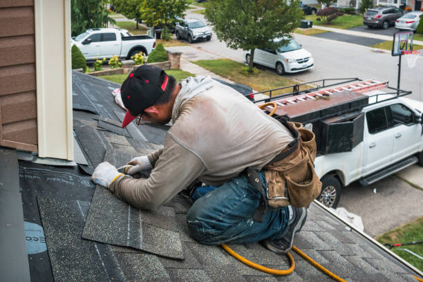 Professional Flat Roof Repair technician working in Weston, MA